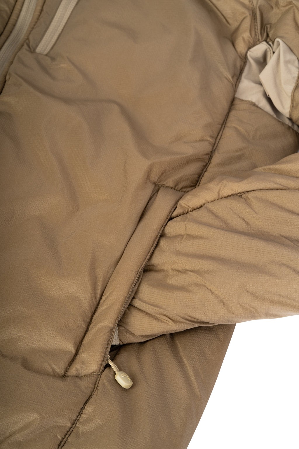 Close-up of zipped chest pocket on Viper Tactical Frontier Jacket for secure valuables storage