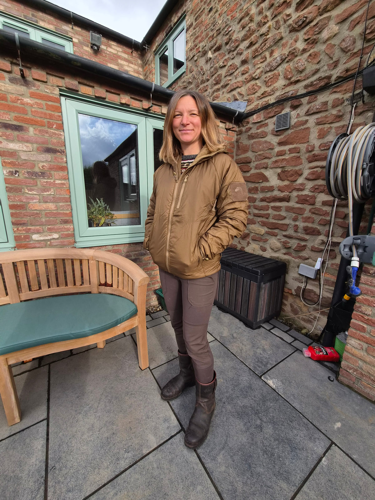 Kirkbourne Spaniels events manager, wearing the Viper Tactical Frontier Jacket in size Small, demonstrating the unisex fit