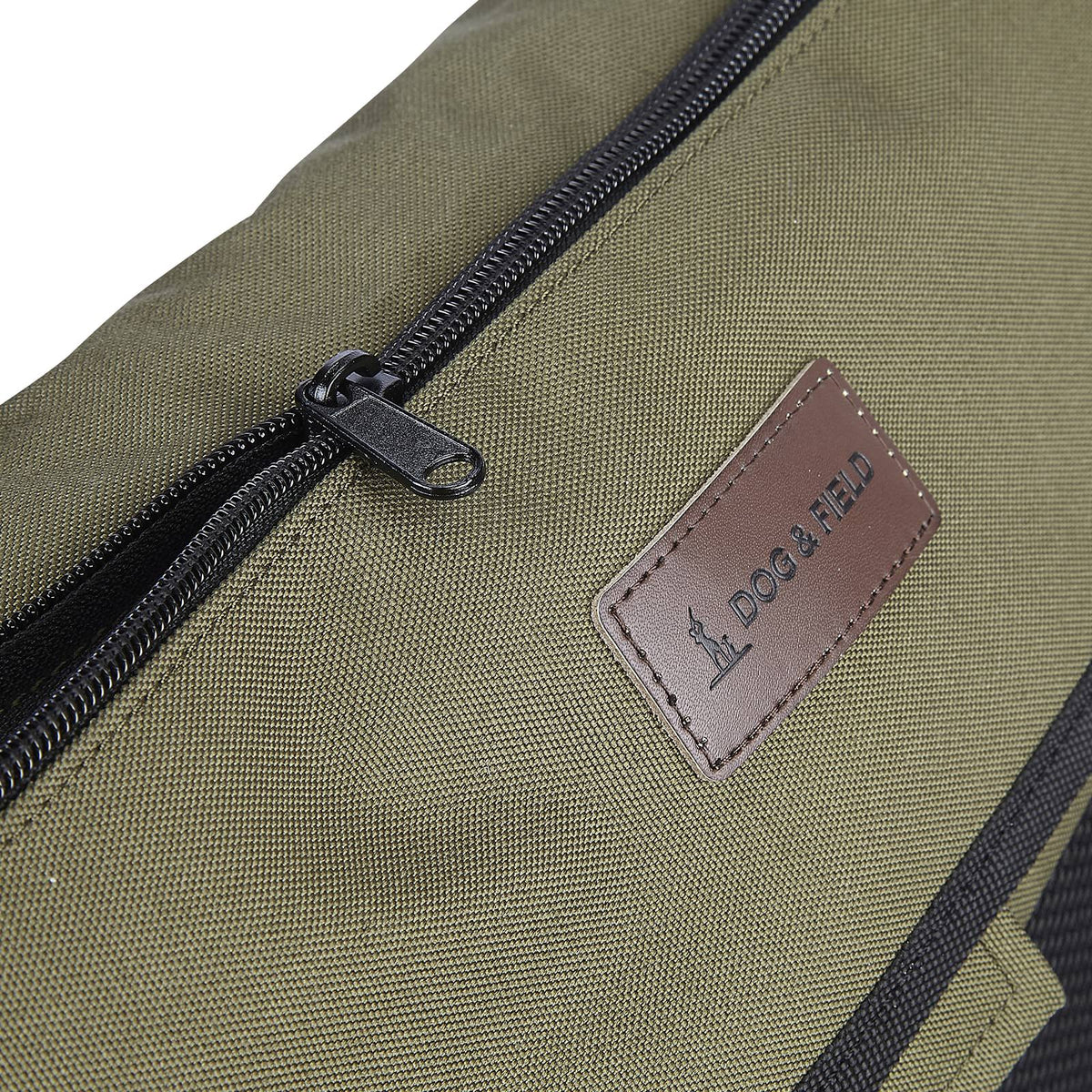 Zip detail of Dog and Field large game and dummy bag in olive green - flap zipper pocket for secure phone and key storage with washable removable inner liner for easy cleaning after gundog training and trialling