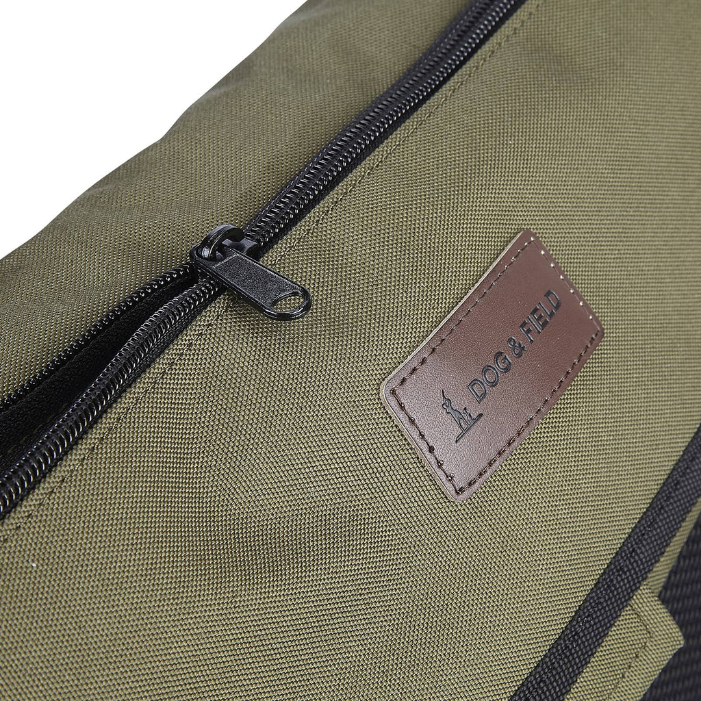 Zip detail of Dog and Field medium game and dummy bag in olive green - flap zipper pocket for secure phone and key storage with washable removable inner liner for easy cleaning after gundog training sessions