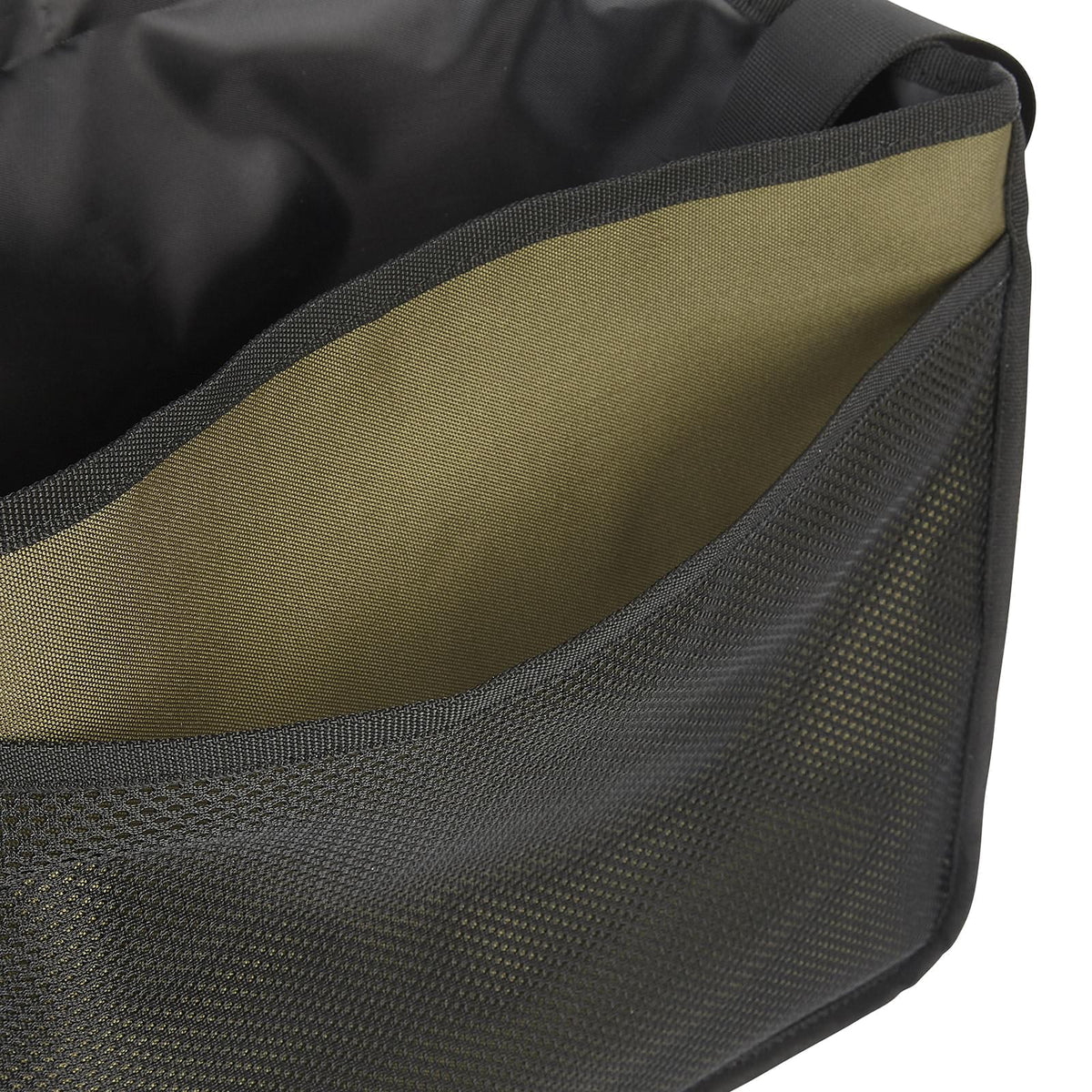 Inside detail of Dog and Field small game and dummy bag in olive green - zip pocket interior for phone and key storage with main compartment for dummies and game during gundog training and field work