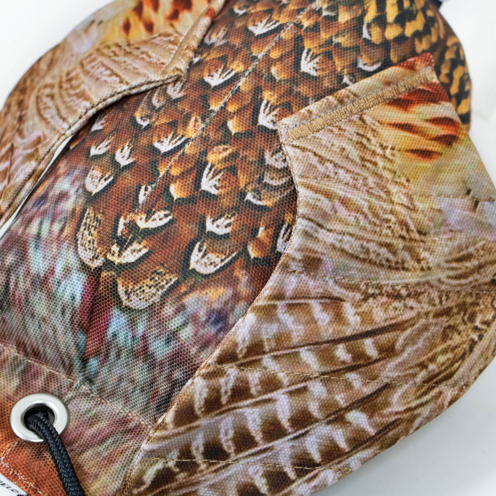 Close-up feather detail on Dog & Field Original Clone cock pheasant dead bird dummy - deep detail immersion ultra-HD 3D photographic cock pheasant feather print for maximum realism in gundog training